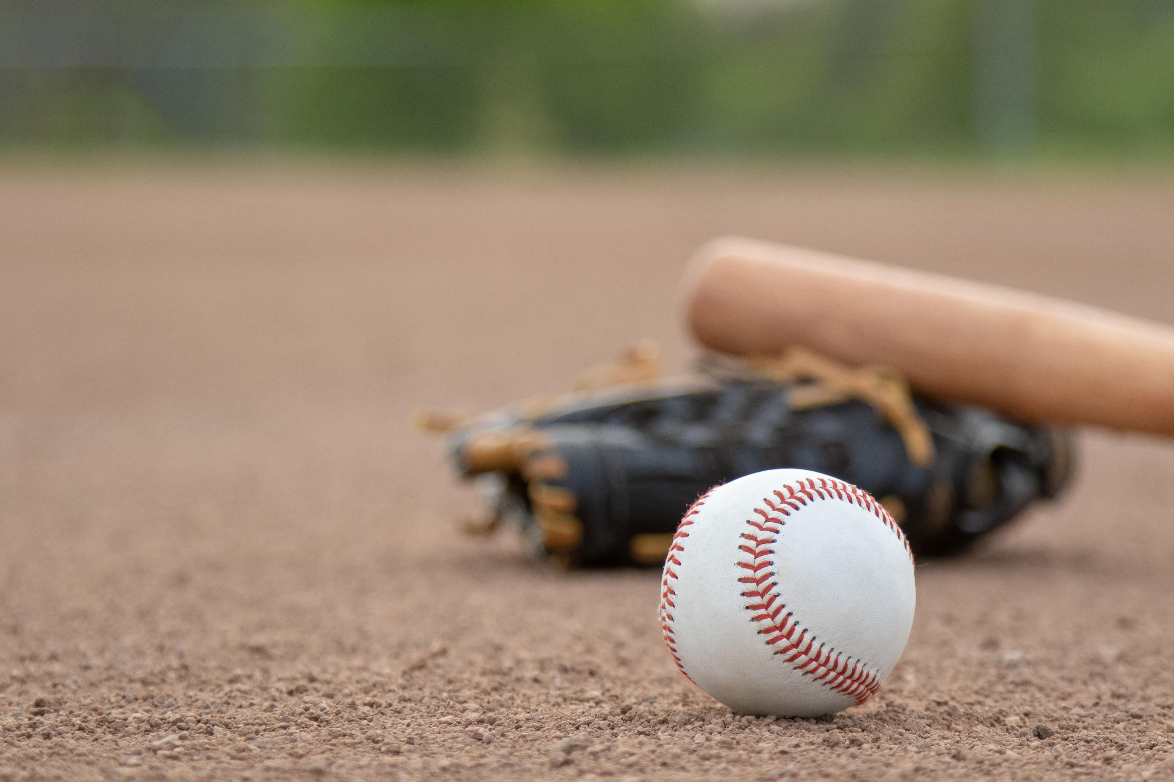 Baseball bat, glove, and ball